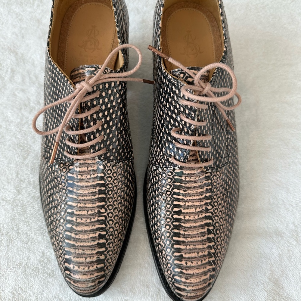 Sleek Black and Pink Heels with Modern Flair